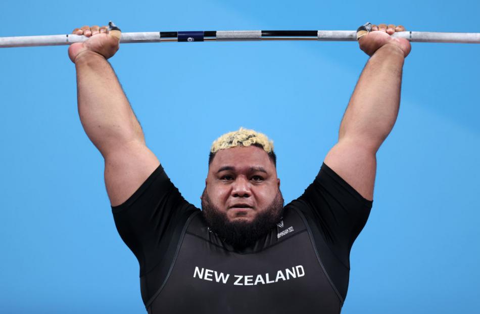 David Andrew Liti lifts during the clean and jerk section of the men's 109kg+ weightlifting final.