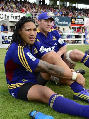 Ma'a Nonu (left) and Brad Thorn watch the pre-season match between the Highlanders and the...