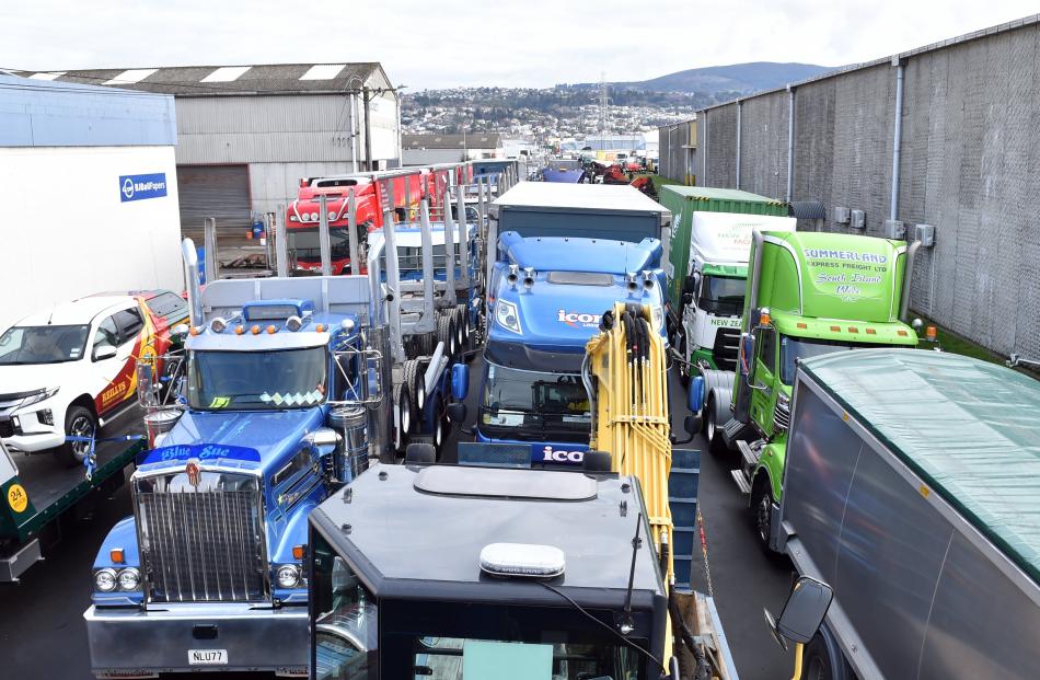 Otaki St is jammed with large trucks as part of the Special Rigs for Special Kids event yesterday.