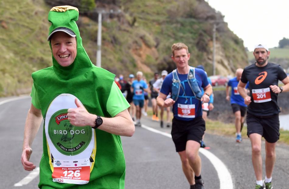 Anthony Eyles (left) shows off his unorthodox running gear ahead of Sam Lee (centre) and Gallien...
