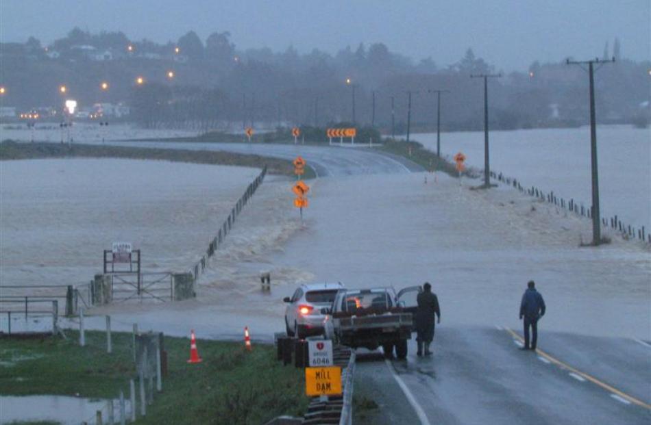 No way through...Floods close State Highway 1 at Mill Dam, just north of Maheno. Photo by Andrew...