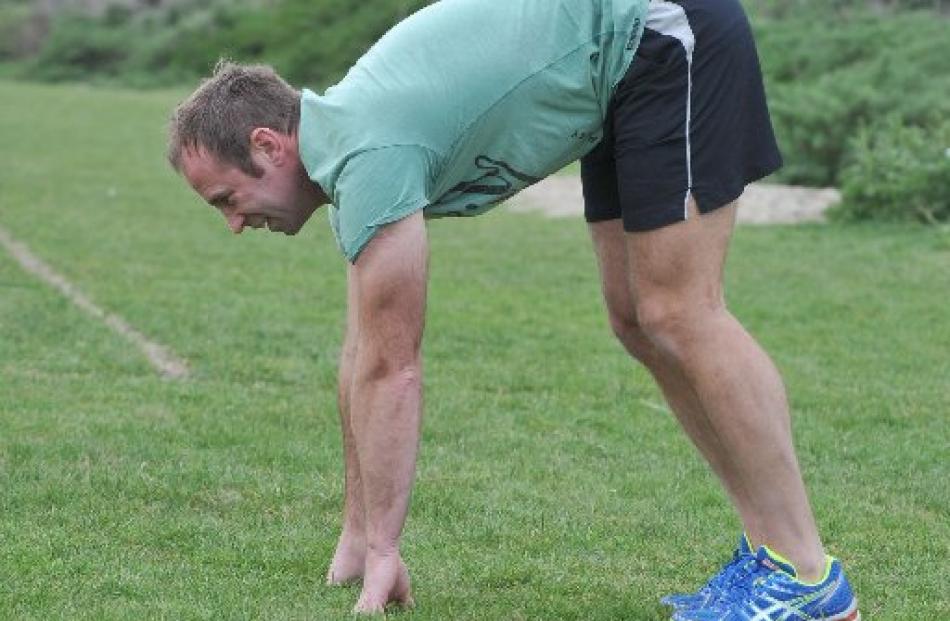 Calf stretch: With hands on the ground, form an A with your body while trying to keep your heels...