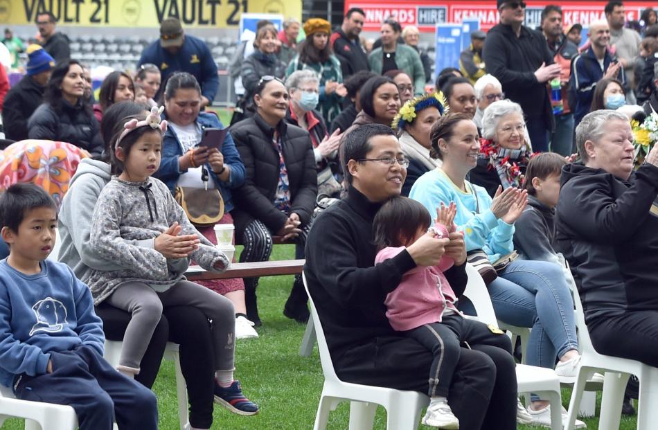 The crowd watches the performances at the festival.