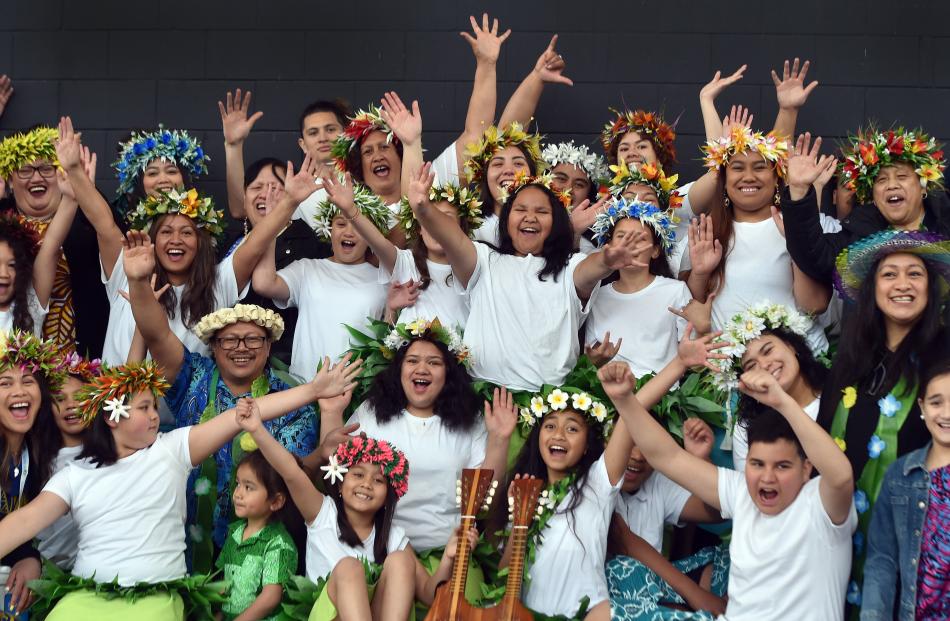 Members of the Cook Islands community celebrate after their performance at the Moana Nui Festival...