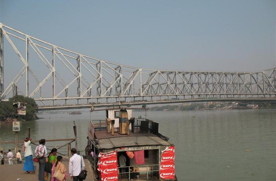 The Howrah bridge spans the Hooghly,  but ferries are the quickest way to cross the river.