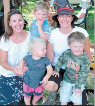 Queenstown folk (from left) Caroline Hutchison with daughter Hazel Van Asch (16 months), friend...