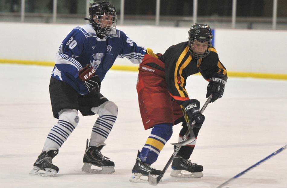 St Andrew's Taylor Boyd and John McGlashan Sam Sheard meet 
...