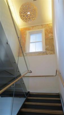 The new  staircase at the  H.D. Skinner Annexe passes beneath a section of wall which has been...