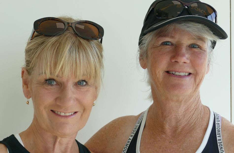Sisters Vicki Dewar, of Mosgiel (left), and Bronwyn Anderson, of Portobello, keep warm inside...
