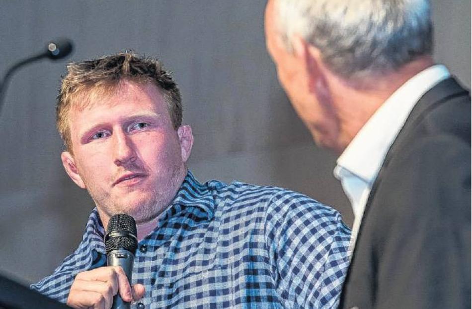 Sportsman of the Year . . . Fletcher Newell (left), talking with Tony Hall, a member of the North...