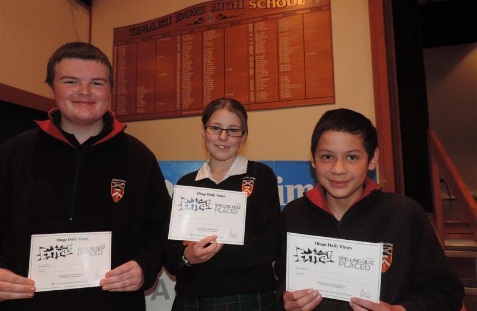 Gaining second place in the Extra! spelling quiz last night were  Geraldine 3 (from left) Matthew...