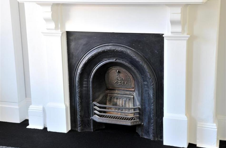 The original fireplace has been preserved in the redeveloped Perpetual Trust Lounge. Photos by...