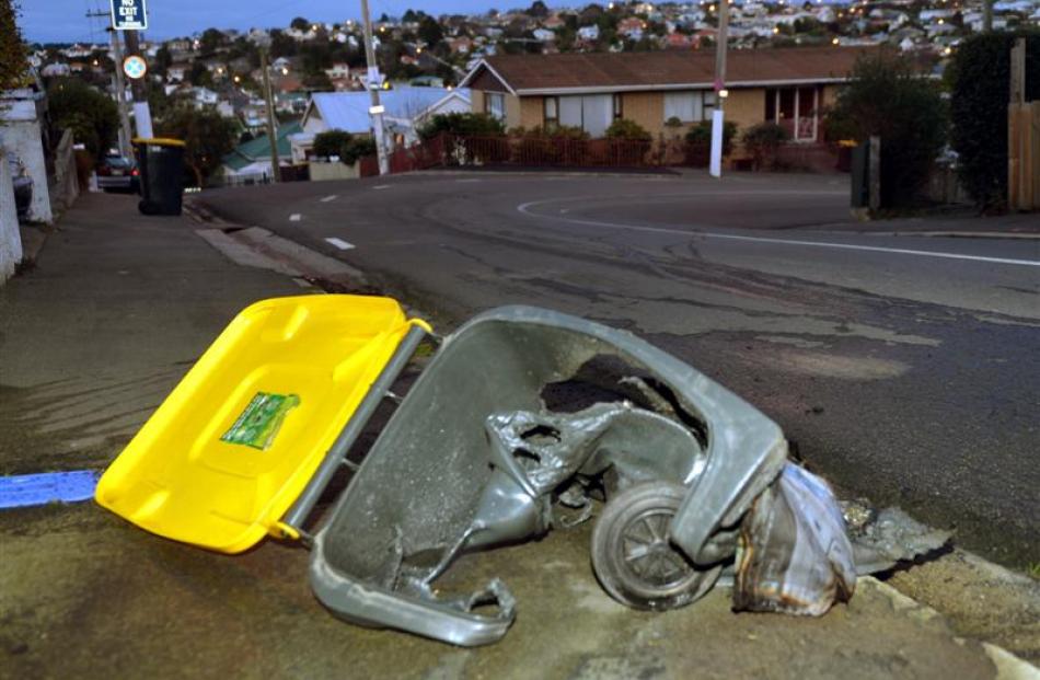 Wheelie-bins burnt in Dunedin yesterday: Haig St. Photos by Stephen Jaquiery.