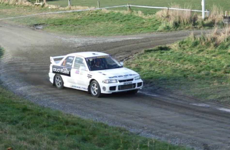 Andrew Graves (Gore) cruises to victory in his Mitsubishi EVO 3 in the final stage of the Rally.