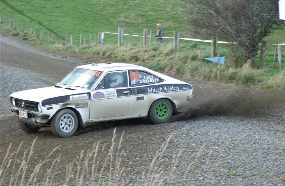Taylor Jansen,  of Christchurch,  charges out of a 90-degree corner in his Datsun 1200 coupe in...