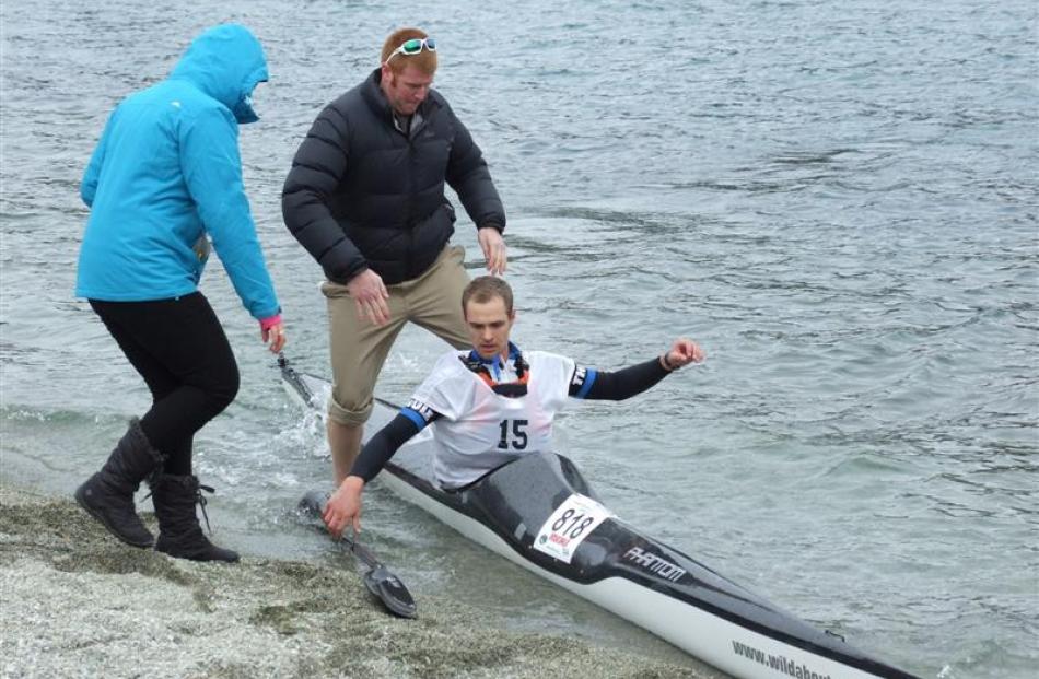Adam Milne, who finished in third place, transitions from  kayaking to running.