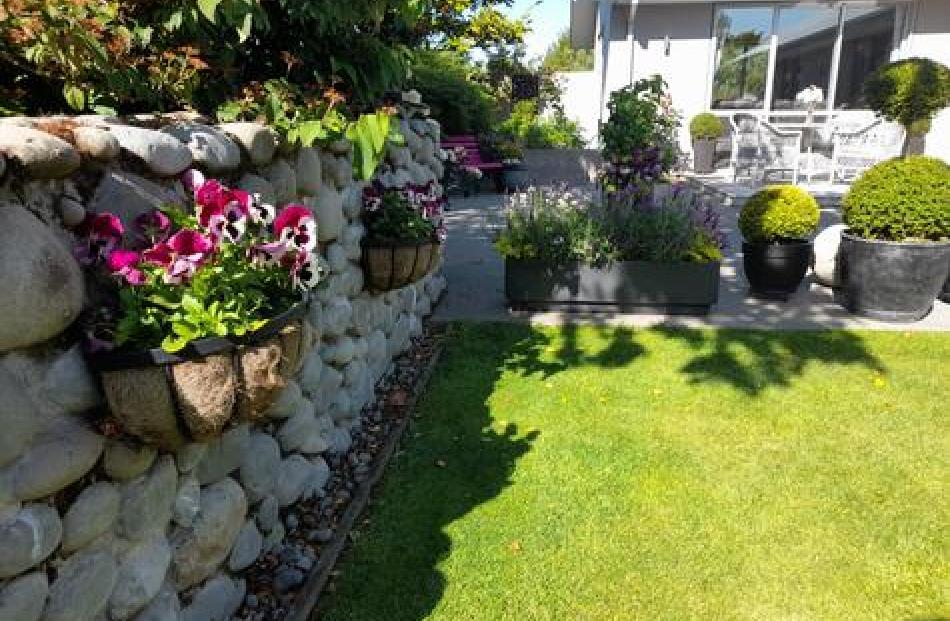 The East Maddisons Rd garden features a wide variety of trees, shrubs and flowers. Photos: Supplied