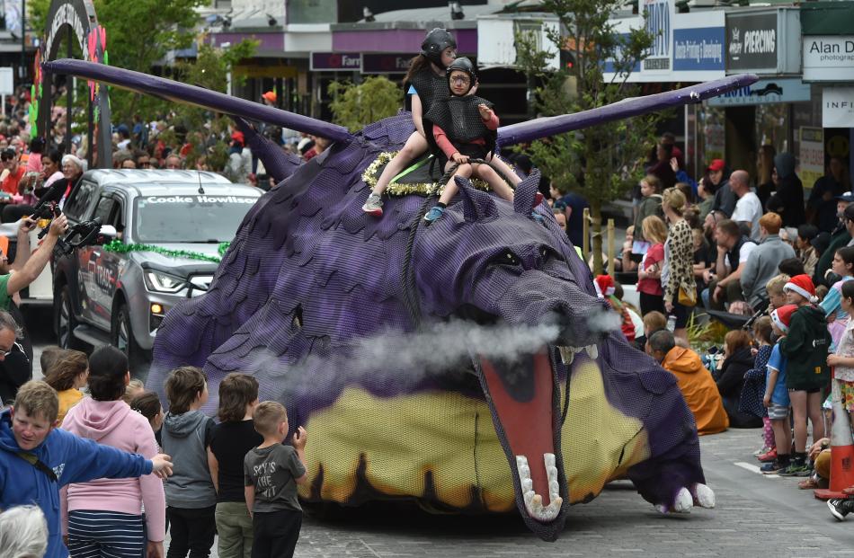 A creative creature gets fired up at the parade.