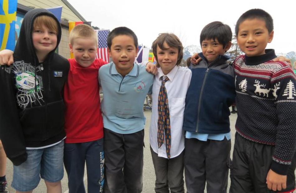 New Zealand pupils (from left) Samuel Jamieson-Gough (10), Troy Cryer (9), Aaron Li (11), Carlos...