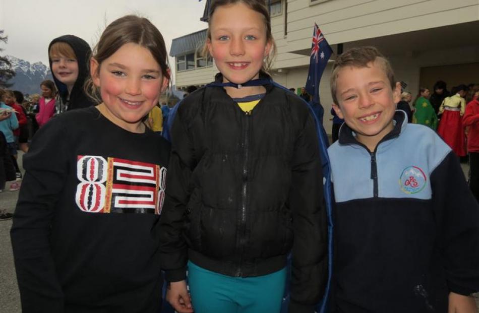 Pupils (from left) Lucy King-O'Donnell (8), representing New Zealand, and Riley Fitzgerald (8)...