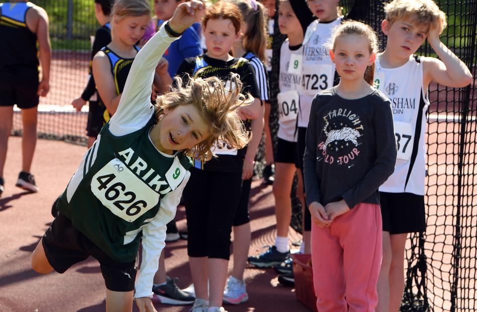 Jonas Machek (9) show style in the gumboot throw.