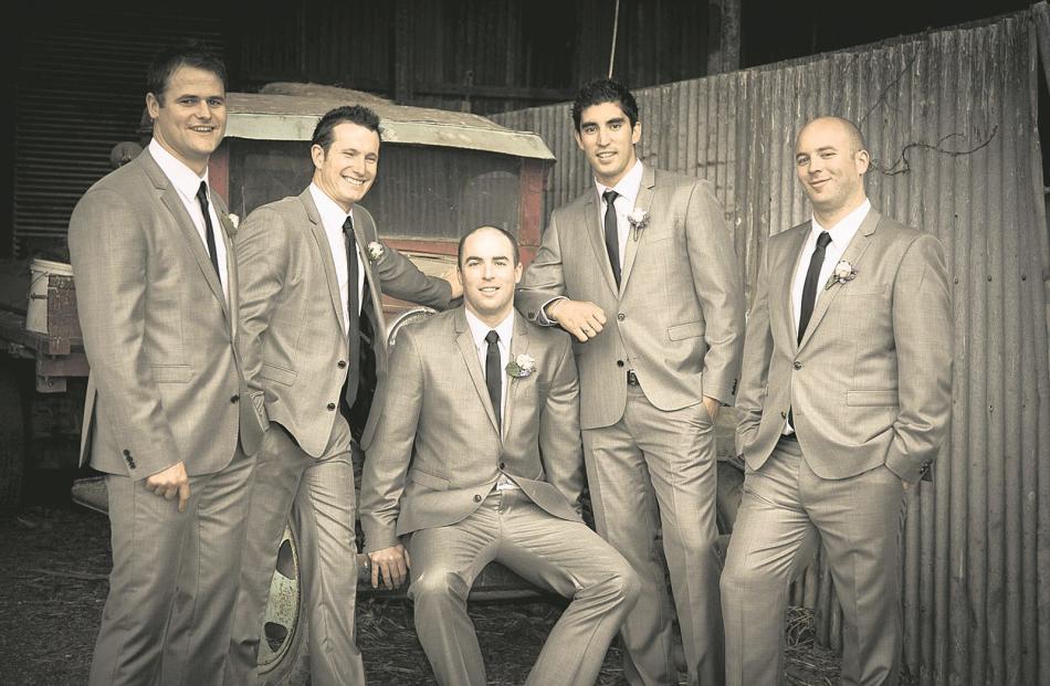 Drew Campbell and his attendants at his wedding to Hannah at Grandview Gardens.
...