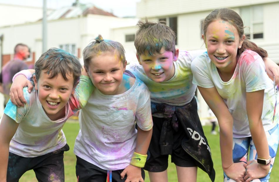 Catching their breath at the finish line of the Night 'n Day Dunedin Rainbow Run in October were ...
