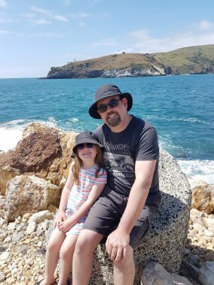 Exploring the mole at Aramoana on New Year’s Eve are Zoe Lawrence (6) and her father Glenn....