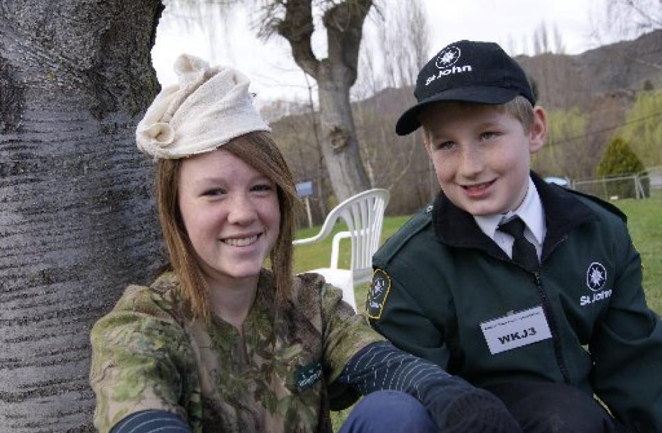 Emma Grice (16), of Roxburgh, is patched up by Johannes MacKay (9), of Queenstown, following a '...