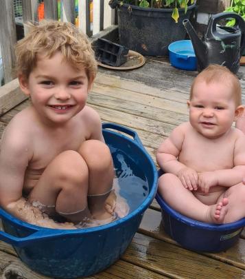 Beau (2) and Bella (7 months) Kerr at Papatowai on January 4. PHOTO: TED KERR