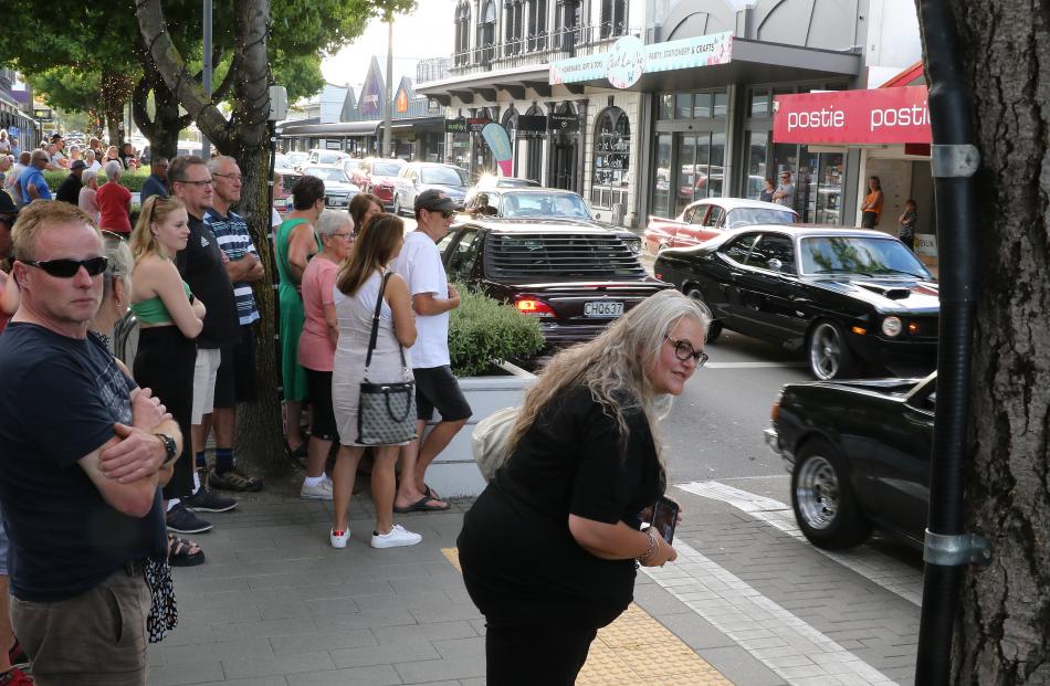 Better view . . . Some of the large crowd of spectators who lined the streets of Rangiora  to...