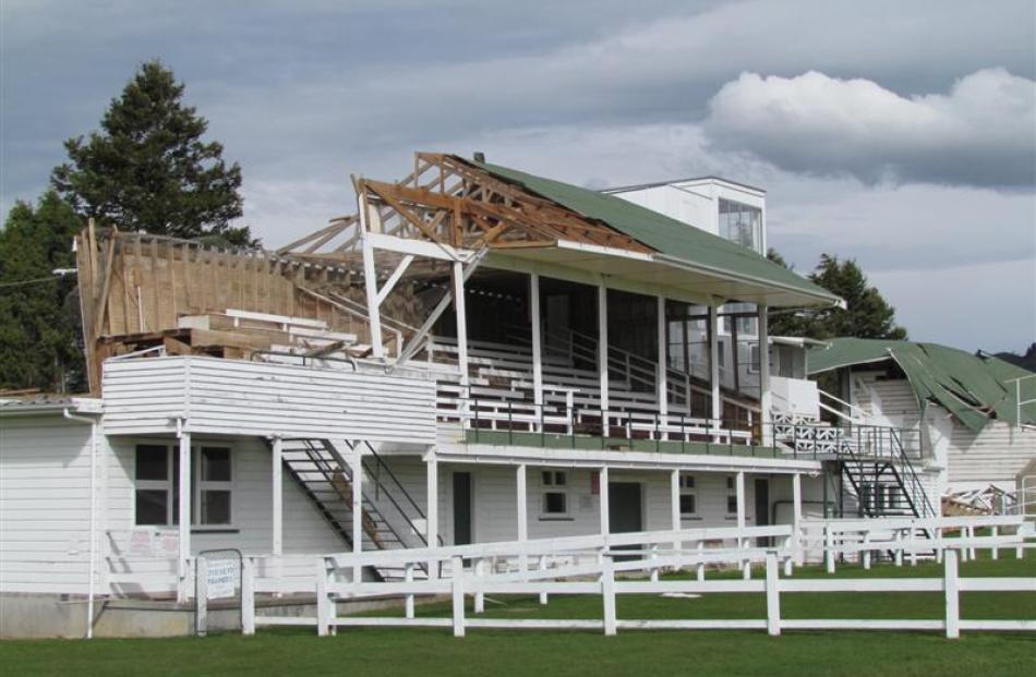 The main stand left with just half a roof.