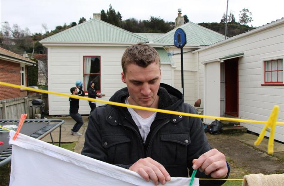Student Damon Cleverley (21) says living in Northeast Valley is safe but that he and fellow...