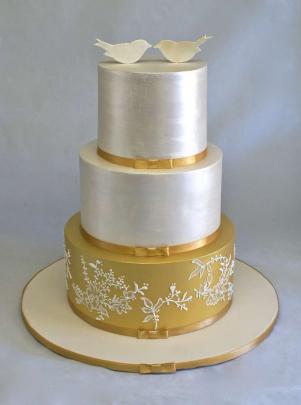 The cake should reflect the couple and what they are into, and their theming and colours of the...