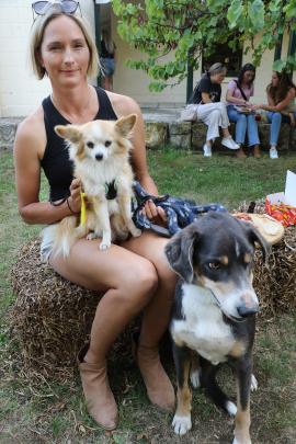 Biding their time . . . Waiting their turn at the Bark Up, were Rev and Mouse with owner Larissa...