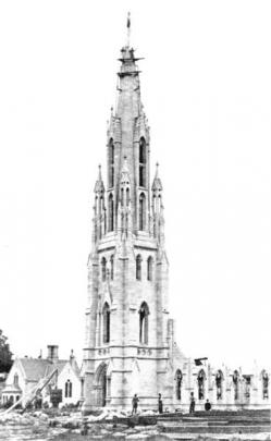 First Church of Otago under construction in July, 1870. In the background is the manse, also...