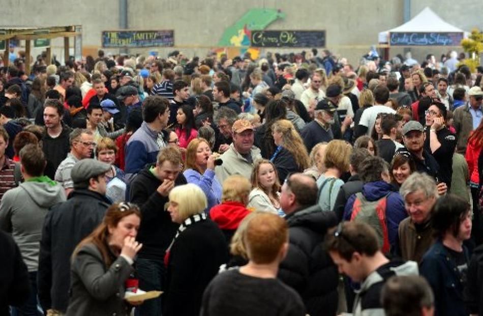Crowds mingle and munch during the Port Chalmers Seafood Festival on Saturday.