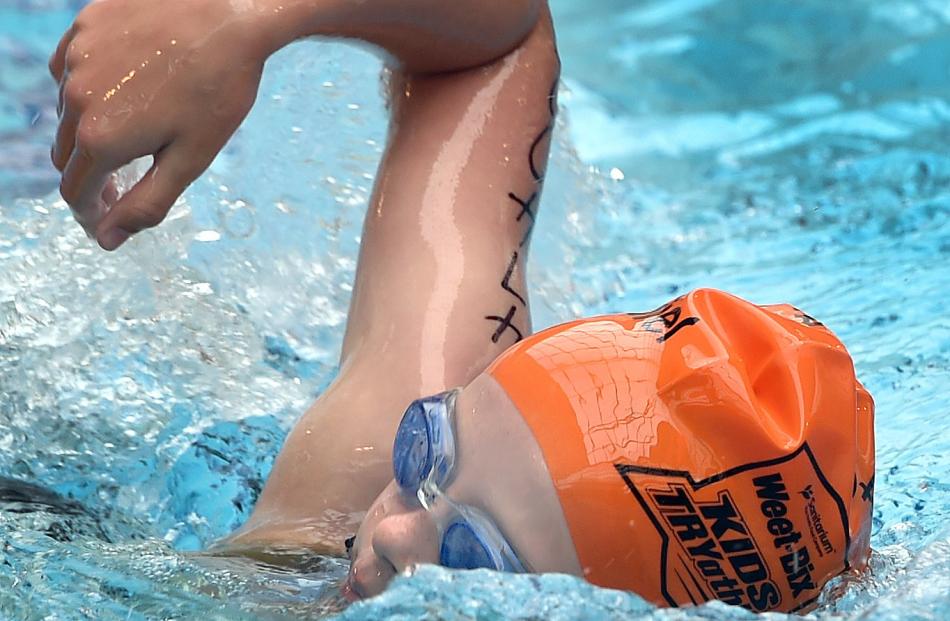 Holly Procter (9), of Dunedin, during the swimming leg.