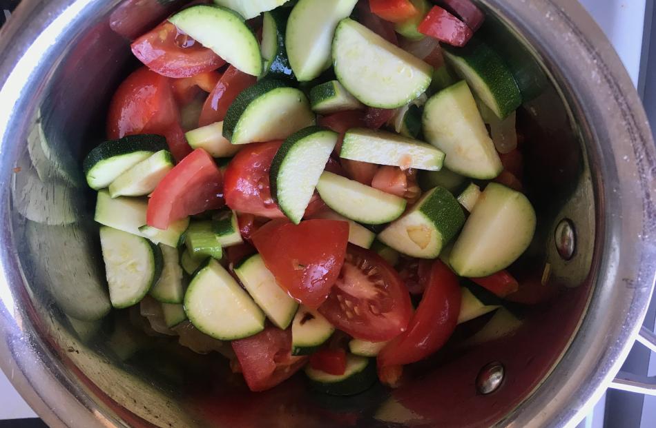 Cook courgettes with tomatoes and onions and freeze for winter.