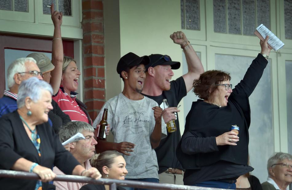 Several racing enthusiasts enjoy backing the winner.