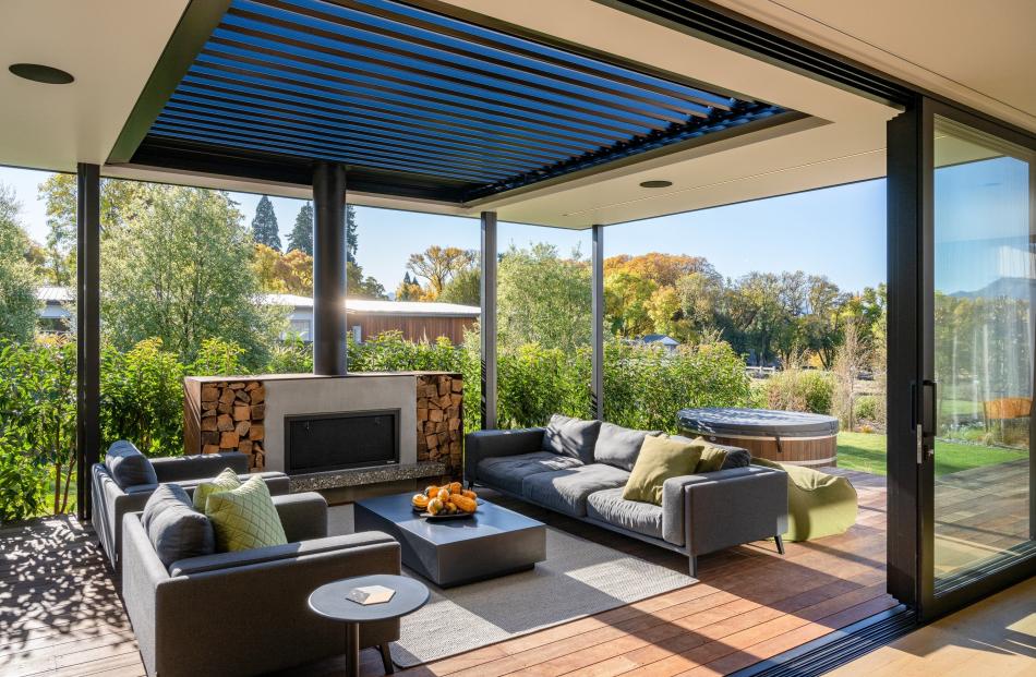The outdoor living area feels like a natural extension of the interior. PHOTO: SAMPFORD CATHIE
