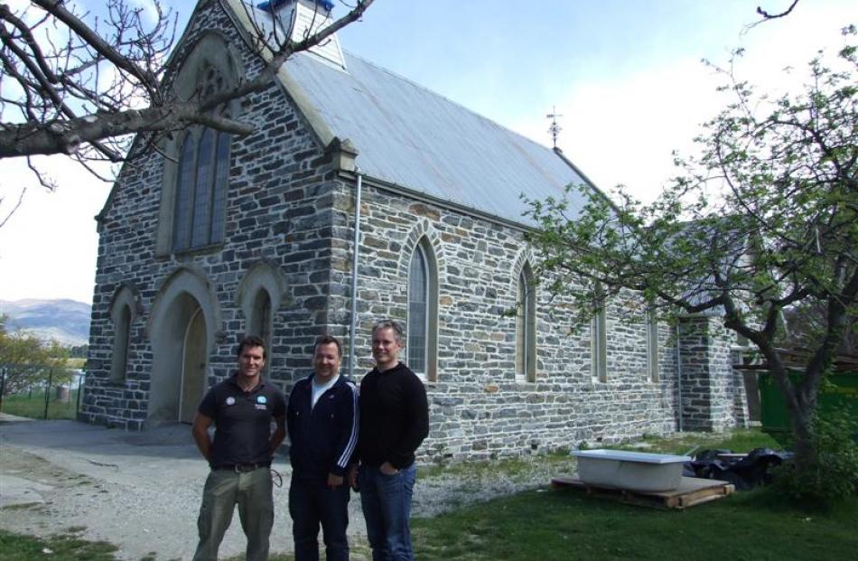 The team behind renovations to the former Presbyterian church, (from left) builder Shaun Hunter,...