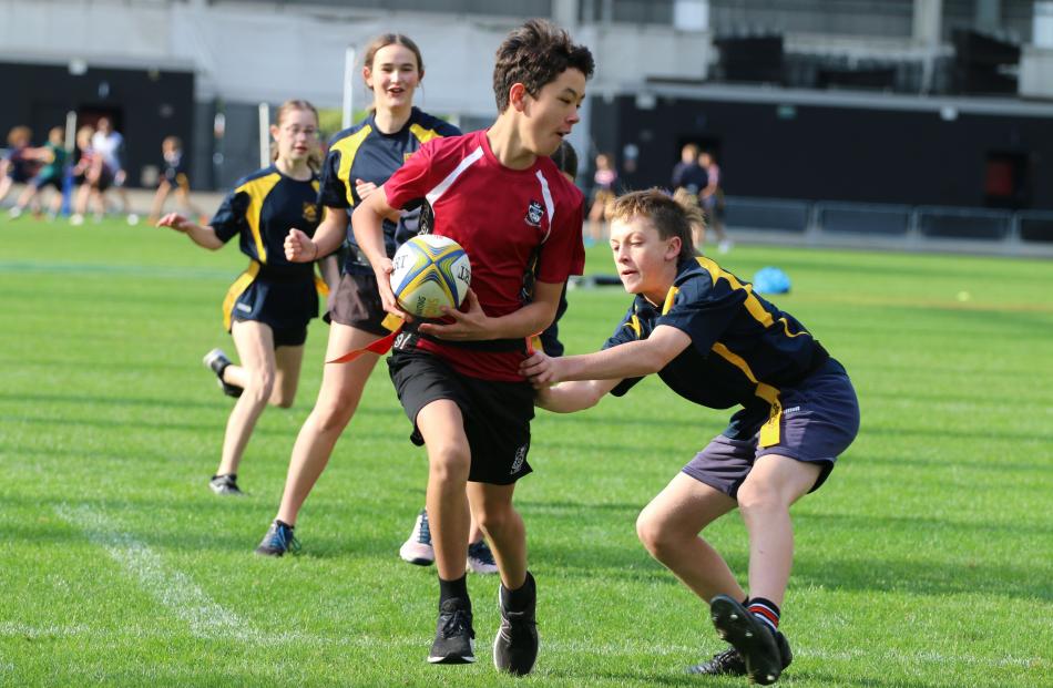 Joe O'Sullivan-Naito (Logan Park) makes a break against Lawrence Area School during the Otago co...