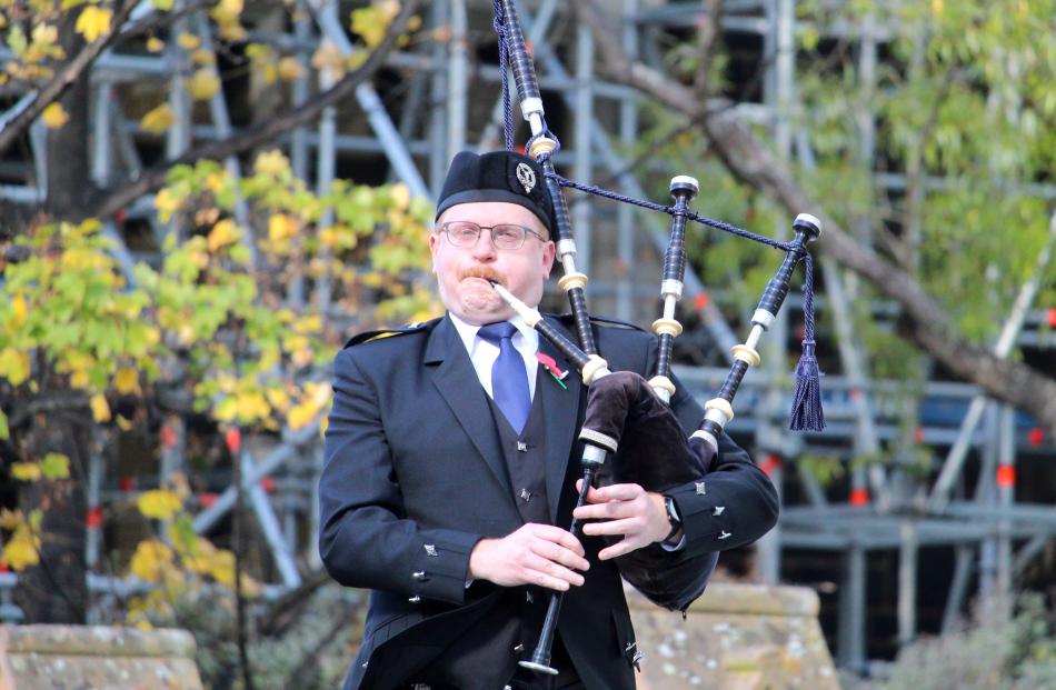 Piper Murray Tannock welcomes those attending at the beginning of the service.