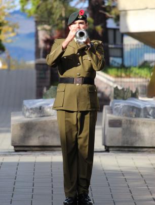 Trumpeter Tom Oldham plays the Last Post during the Otago University Students' Association Anzac...