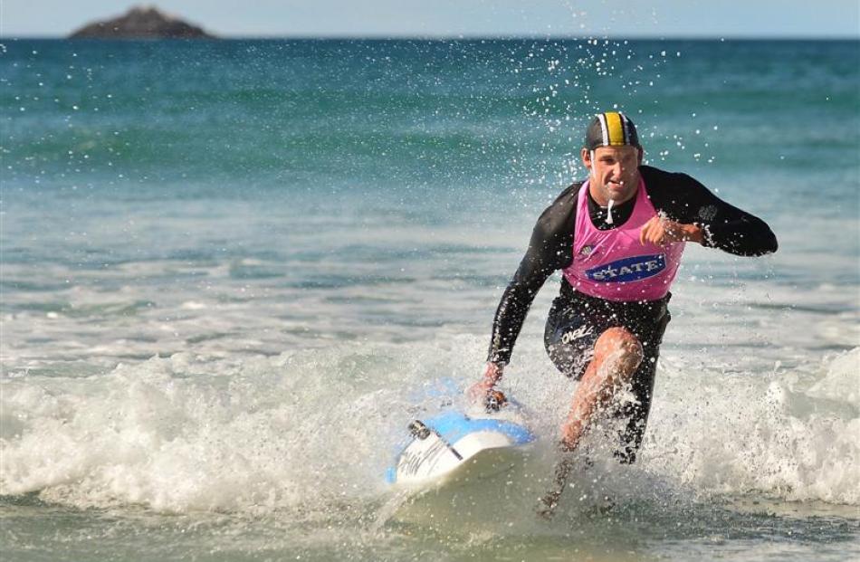 Andrew Newton (Mount Maunganui), the fastest board paddler, nears the finish. Photos by Peter...