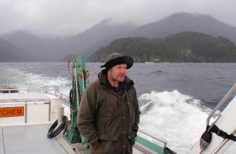 Elton Smith on the way to Breaksea Island aboard Doc vessel Southern Winds. Photos by Clement...