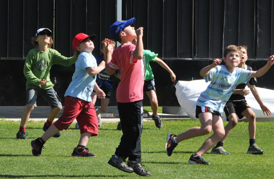 All eyes are skyward during catching practice.