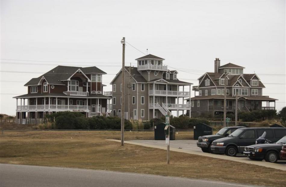 Pretty much the whole coastline of the eastern US is fronted by houses like this. Most are rented...