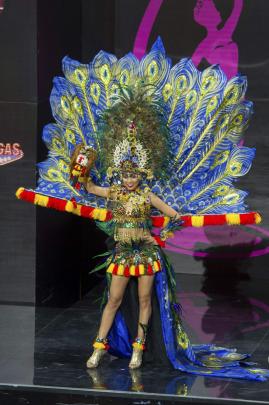 Whulandary, Miss Indonesia.